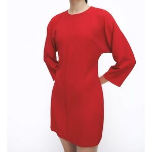 Zara Round neck dress with below-the-elbow length sleeves. Front ribbed detail.